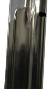 Metal handgun magazine standing upright, showing a curved top and base plate.