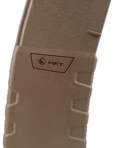 Tan polymer rifle magazine with textured base and MFT logo, oriented upright and showing ribbed sides for grip griping.