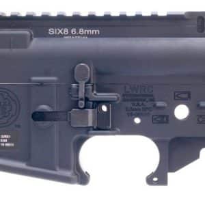 AR-style rifle lower receiver with a 6.8mm upper, black finish, and a Picatinny rail along the top; various markings and controls visible on the receiver.