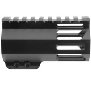Black rifle muzzle brake with a top Picatinny rail and side vent slots for recoil reduction.
