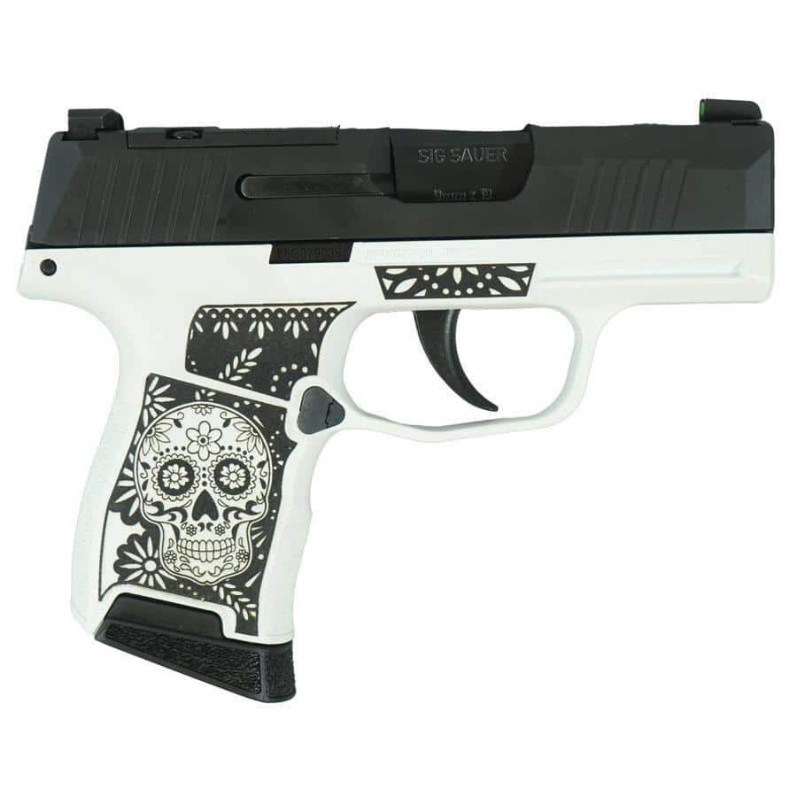 White handgun replica with black slide and decorative skull-pattern grip design, viewed from the side of a toy pistol