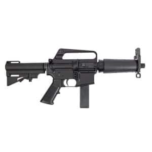 Black assault rifle with a vertical magazine inserted, carrying handle, and adjustable stock, shown in profile