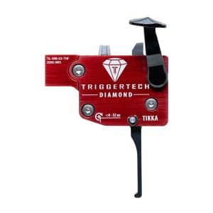 Red TriggerTech Diamond rifle trigger for a TIKKA, with white diamond logo and black sear lever on the side.