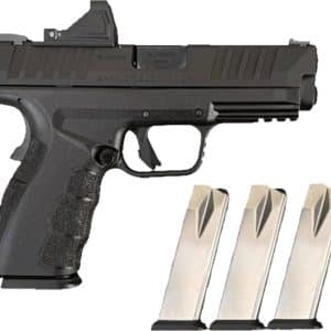 Semiautomatic handgun with a textured grip and three spare magazines laid beside it, indicating a complete firearms setup.