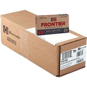 Large brown shipping box with Hornady branding; a smaller Frontier cartridge box rests on top, showing label and barcode for ammunition.
