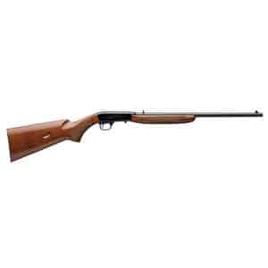 Bolt-action hunting rifle in side profile with wooden stock and long barrel.